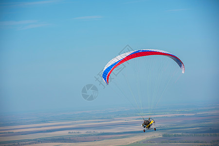 飞机剪影山岳的滑坡跳伞翅膀顶峰肾上腺素跳伞员段落行动蓝色竞赛运动员背景