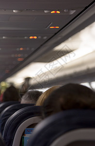 乘客在飞机上坐着 准备出发世界走廊经济服务椅子商业航空公司航程旅行压力图片
