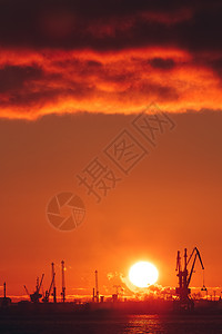 背景橙子炎热的冬季日出太阳橙子电影红色天气反射戏剧性金子天空港口背景