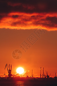 背景橙子炎热的冬季日出港口黄色戏剧性红色天空太阳天气日落电影金子背景