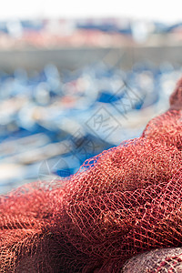 摩洛哥Essaouira渔港的红鱼网绳索农业生产家族公司渔夫海鲜日落食品旅游图片