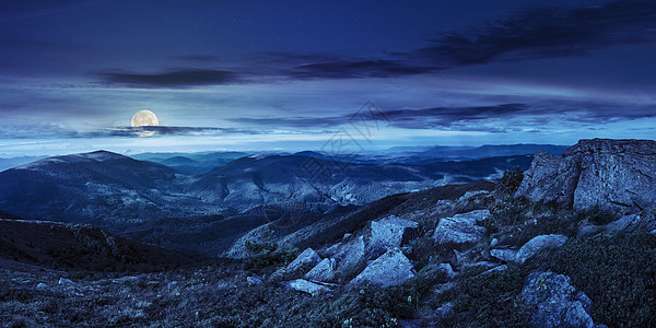 夜间在山顶的峡谷中地球农村山坡风景边缘旅游戏剧性星星月亮旅行图片