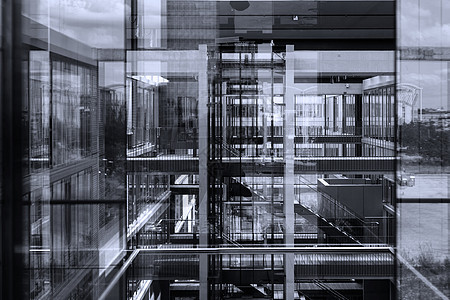 现代办公楼中的抽象窗口反射窗户电梯入口技术中心大厅贸易走廊地面展览图片