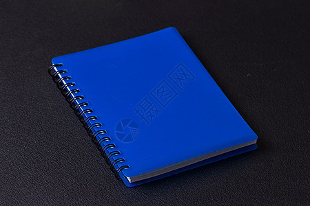 蓝色在螺旋上的笔记学习活页夹备忘录笔记纸会议床单书法学校戒指日记图片