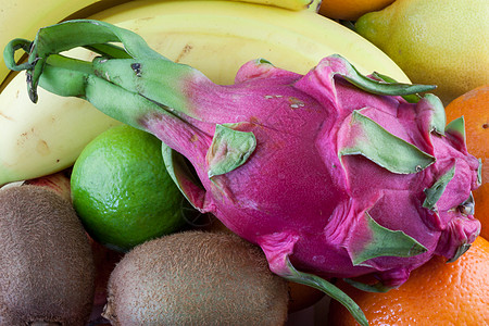 不同食用水果的麦地利宏观橘子格式香蕉植物群皮肤展示奇异果纤维树叶图片