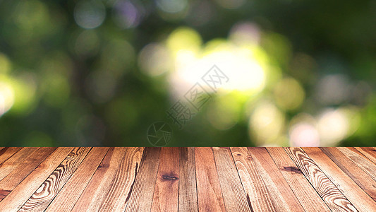 透视木材和散景光背景 产品展示模板 模糊移动的天然绿叶背景上的木桌面奢华嘲笑桌子木头橡木推介会商业板栗零售店铺图片