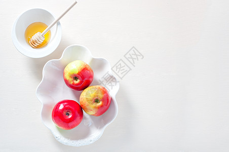 的苹果 石榴和蜂蜜宗教桌子文化饮食食物健康饮食乡村祷告季节假期图片