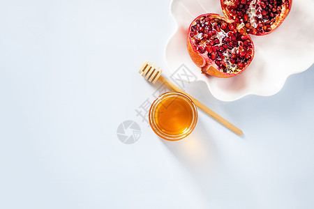 的苹果 石榴和蜂蜜健康饮食假期乡村水果文化传统祷告号角宗教仪式图片