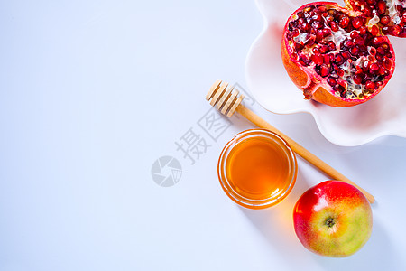 的苹果 石榴和蜂蜜假期季节传统宗教盘子号角饮食水果食物仪式图片