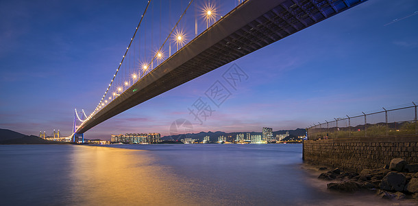 香港清马大桥下日落曲线运输市中心景观辉光城市地标交通海岸蓝色图片