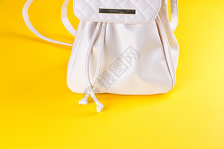 女性白皮背背包白色书包叶子行李钱包学校配饰旅行黄色手提包图片