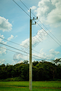 电线杆位于稻田的电场上网络危险变压器飓风天空技术力量城市金属两极图片