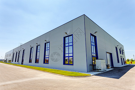 工业建筑上的铝立面入口加载货运仓库蓝色财产技术货物玻璃材料图片
