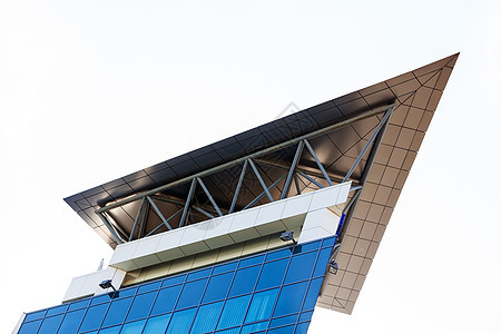 现代建筑 有玻璃面罩财产技术公司刮刀商业摩天大楼投资蓝色反射天空图片