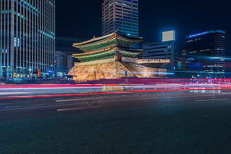 韩国的Traffic模糊了南韩首尔Namdaemun门建筑街道速度交通旅行建筑学旅游地标遗产城市图片