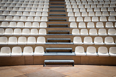 整排塑料座椅座位民众电影白色礼堂场景音乐走廊剧院会议图片