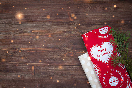 木制背景上的圣诞厨房毛巾松树餐巾圆点肉桂餐厅野餐木头纺织品桌布食物图片