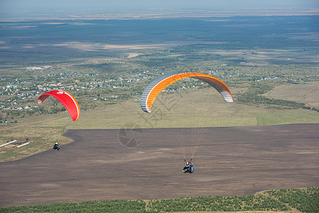山岳的滑坡运动员降落伞飞行竞赛段落跳伞团队活动肾上腺素旅行图片