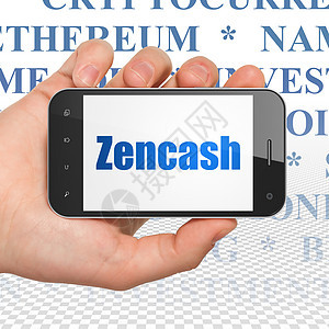 概念手持智能手机与 Zencash 上显示图片