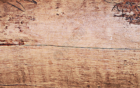 旧裂纹木材表面纹理背景的特写视图图片