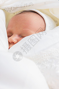 正在睡觉的新生儿婴儿工作室童年身体说谎男生睡眠毯子皮肤家庭微笑图片