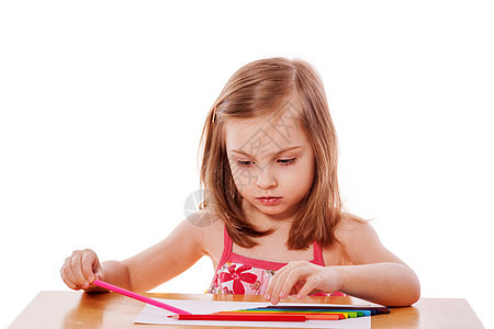 女孩用铅笔绘画桌子快乐金发写作家庭作业教育幸福微笑创造力画家图片