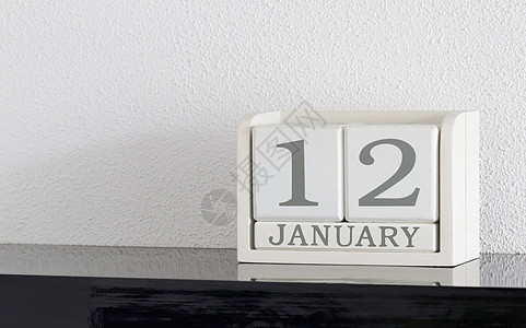 白区块日历目前日期 1月12日和1月白色节日黑色派对历史框架死亡假期会议背景图片