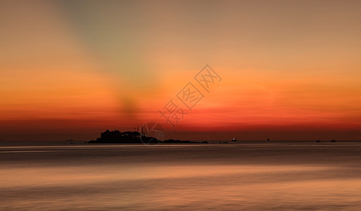 黄金橙色早晨越南天空阳光太阳海岸线热带钓鱼海岸蓝色日落反射晴天图片