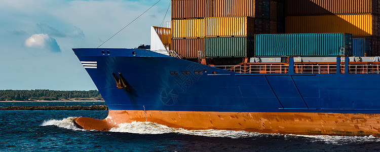 蓝集装箱船舶正在运行中后勤出口货运进口商品航行货物橙子血管金属图片