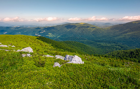 下午山脊的草地坡度天空毯子旅行丘陵石头金库风景资源天堂岩石图片