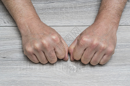 手握手的手姿势办公室皮肤斗争成人男性工人手臂手势商务男人图片