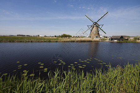 荷兰在Kinderdijk的风车环境植物生态天空乡村蓝色风景历史遗产技术图片