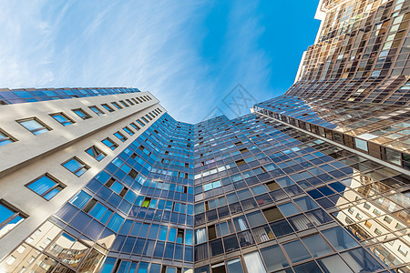 现代建筑外部办公室建筑学公寓建筑物天空玻璃蓝色晴天金融商业图片