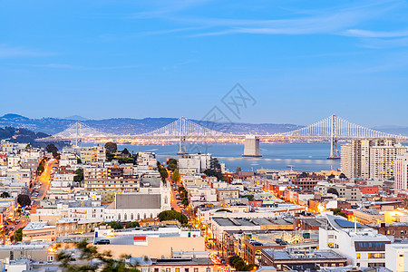 旧金山市中心天际日落景观摩天大楼城市帝国建筑学商业办公室港口海洋图片