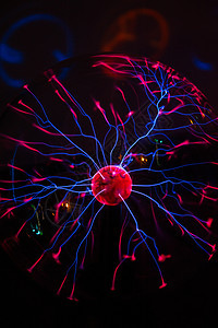 玻璃球中的电等离子体活力力量实验室电子产品紫色圆圈电压收费原子电气图片