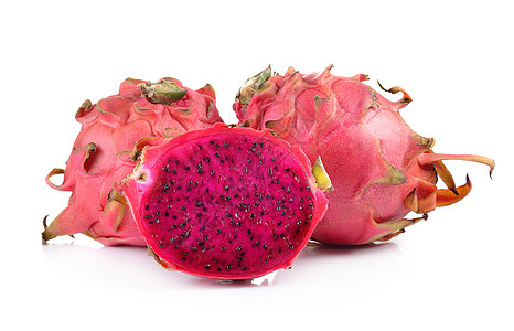 白色背景的红龙果情调热带营养绿色种子食物异国粉色红色饮食图片
