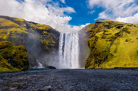 冰岛的Skogafos瀑布旅游岩石溪流蓝色运动环境旅行风景美丽天空图片