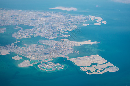 巴林的空中观点高度飞机场蓝色旅游鸟瞰图地平线摩天大楼海洋港口建筑物图片