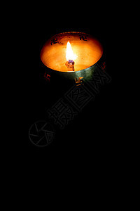 深色背景上的油灯火焰烧伤标志纹理资源喜庆节日宗教环境科学符号图片