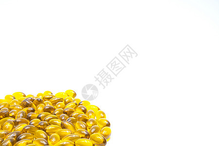 在白色背景上分离的软胶凝胶胶囊中的鱼油制药产品皮肤保健剂量营养药片药品食物黄色图片