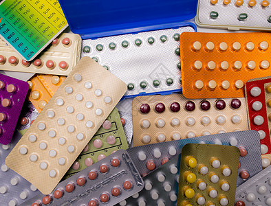一堆五颜六色的避孕药与现代包装 避孕药 医药行业 药房背景 家庭计划女士排卵怀孕蓝色药片药品经期妇科橙子妇科医生图片