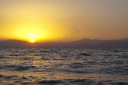 日落反射海景岩石剪影波浪装置支撑水景动力地平线天空图片