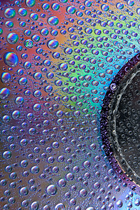 在CD上撒尿数据水面储存光学媒体技术纹理媒介信息色彩图片