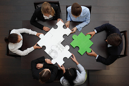 商界人士拼拼谜绿色拼图合作工作商务战略团队团体女士合伙图片
