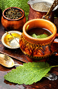 一杯健康的草药茶中医师花瓣乡村饮料草本植物芳香茶叶花草杯子植物图片