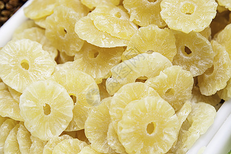 干菠萝切片热带白色食物小吃市场骰子戒指营养水果黄色图片