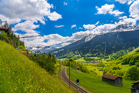 阿尔卑斯山 克洛斯   塞内乌斯 达沃斯 格劳布伦登爬坡蓝色旅行旅游树木建筑学铁路天空森林隧道图片