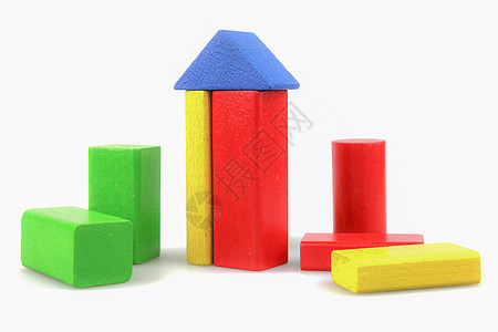 白色孤立的多彩木林建筑块玩具喜悦童年游戏木头婴儿黄色蓝色孩子们操场学习图片