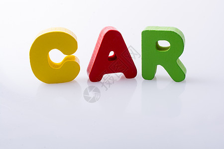 CAR用彩色字母写的单词销售现金预算花费成功车辆钥匙车轮活力旅行图片