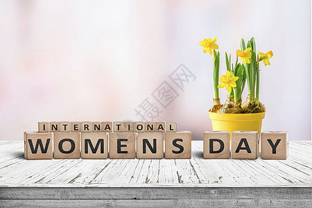 国际妇女节标志 配有黄色水仙花朵图片